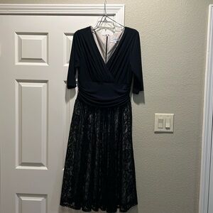 Black with black lace and sequins cocktail dress. Like new condition.